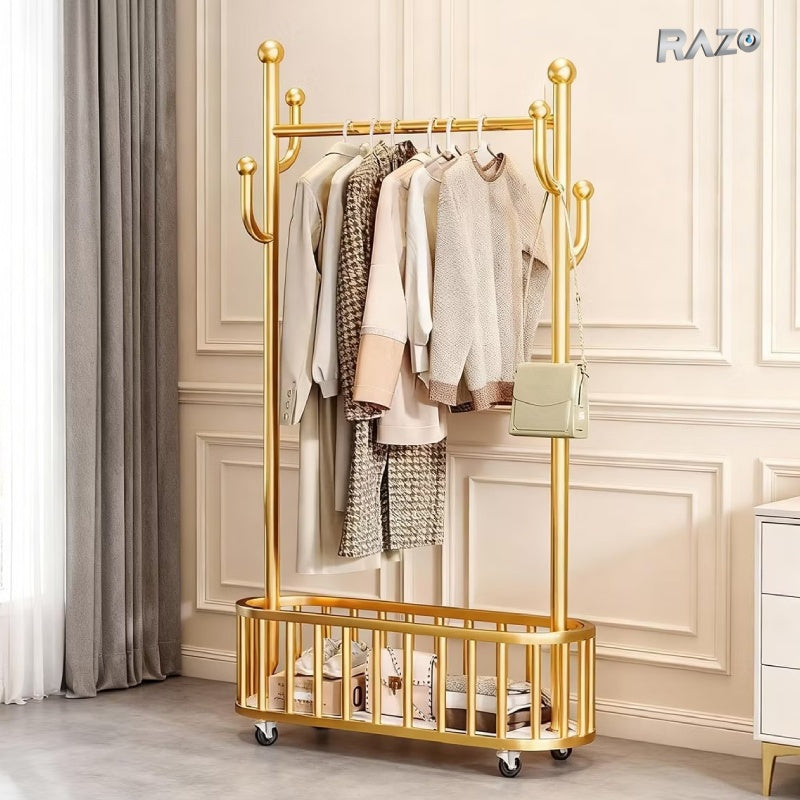 Cuier de podea RAZO metalic cu roti 360° blocabile, cos de depozitare si carlige laterale, capacitate 50 kg, design modern, dimensiuni 80x32x173 cm, auriu