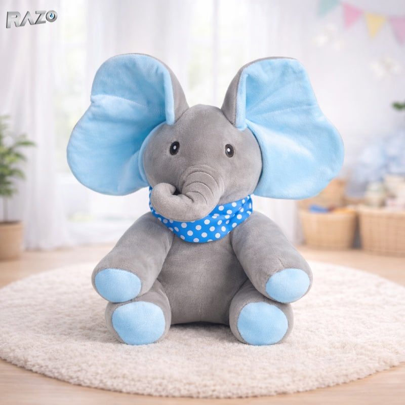 Jucarie interactiva RAZO din plus elefant Cucu-Bau, muzicala, canta si vorbeste in limba engleza, functie peekaboo cu urechi mobile, dimensiuni 30x25 cm, albastru
