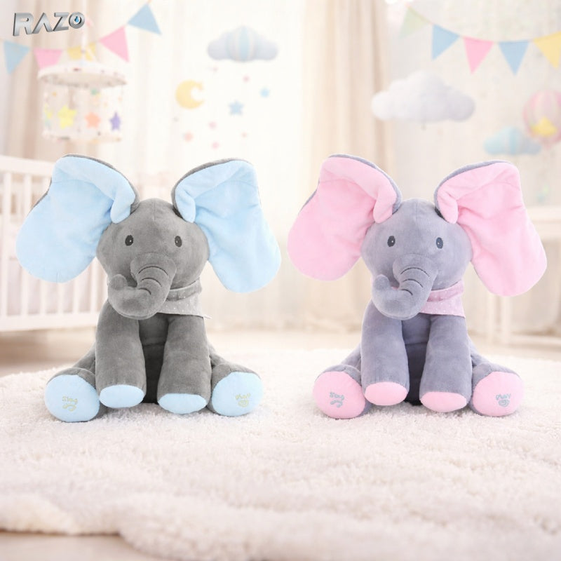 Jucarie interactiva RAZO din plus elefant somnoros, cu sunete, vorbeste si canta, material moale si sigur, functioneaza cu baterii AA
